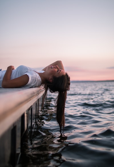 Lying in the dock white woman
